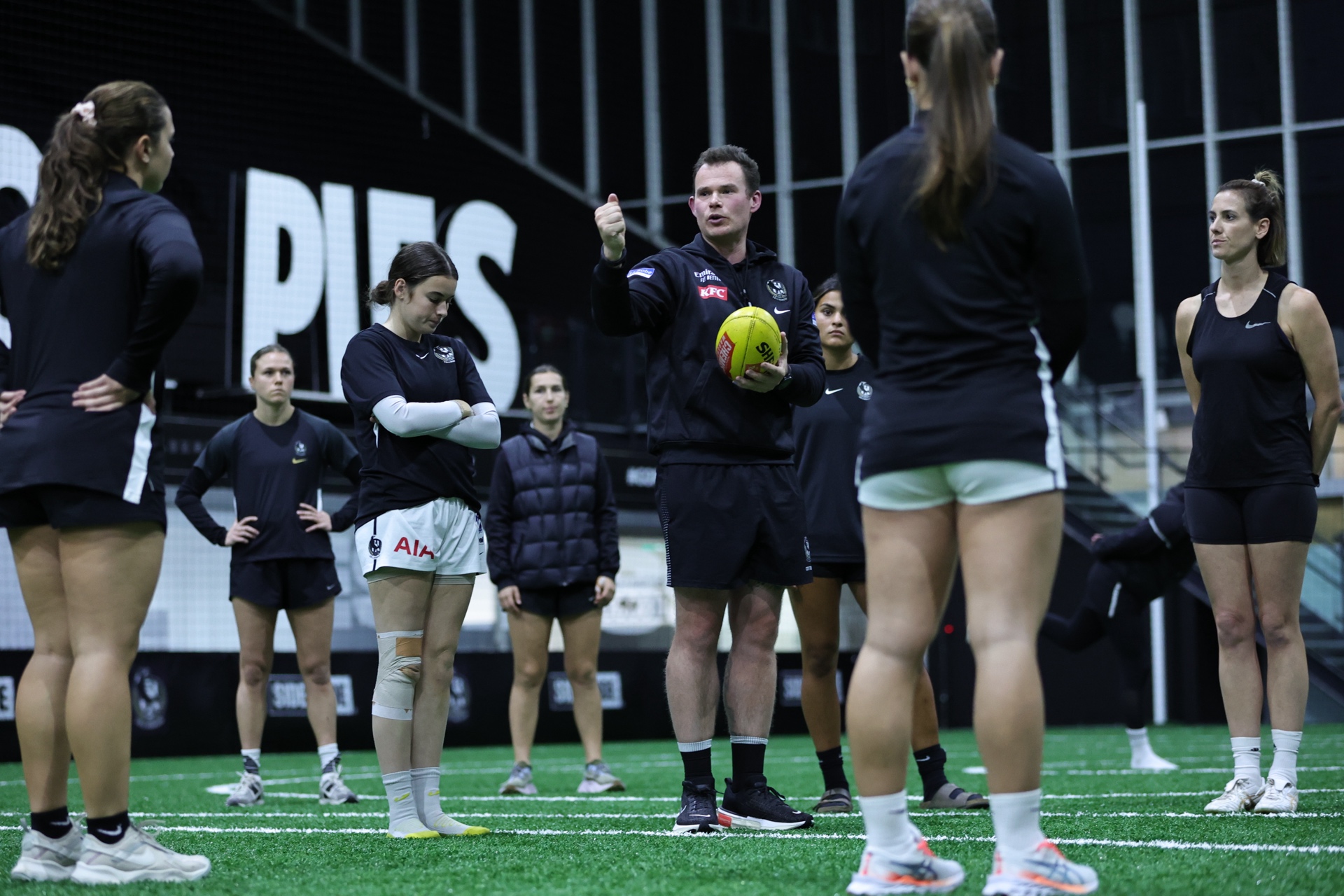 Tom Cashin coaching AFLW athletes